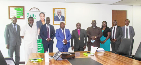 Dr John Kofi Mensah (4th  left), MD of ADB, with the delegation from the Accra Anglican Diocese