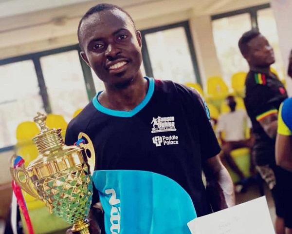 Derek Abrefa displaying his prizes after winning the men’s competition