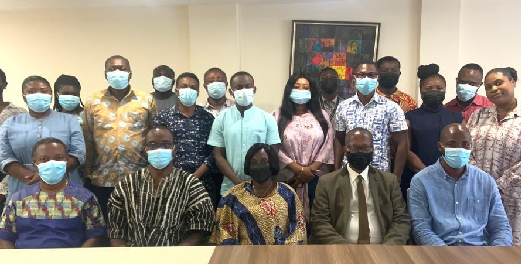 Mr. Roland Affail Monney (seated 2nd left), President, GJA, with participants in the workshop