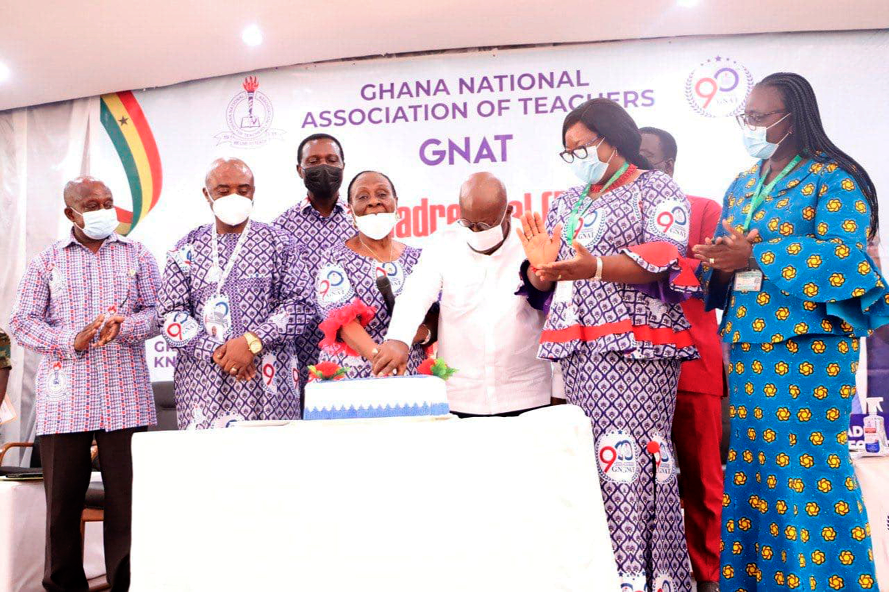  Mrs Georgina Baiden (with mic), first female President of the GNAT, being assisted by President Akufo-Addo (3rd from right), to cut a cake during the opening ceremony of the 53rd national delegates conference of the GNAT at the Great Hall, KNUST, Kumasi. Those applauding include, Mr Simon Osei Mensah (left), Ashanti Regional Minister; Ms Philippa Larsen (2nd right), National President of GNAT, and Prof. Mrs Rita Akosua Dickson (right), Vice-Chansellor, KNUST. Picture: EMMANUEL BAAH