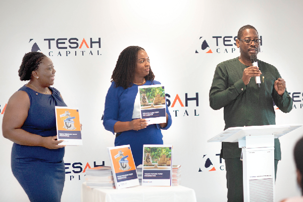 Rev. Daniel Ogbarmey Tetteh (right), the Director-General, SEC, unveiling the new investment products by Tesah Capital