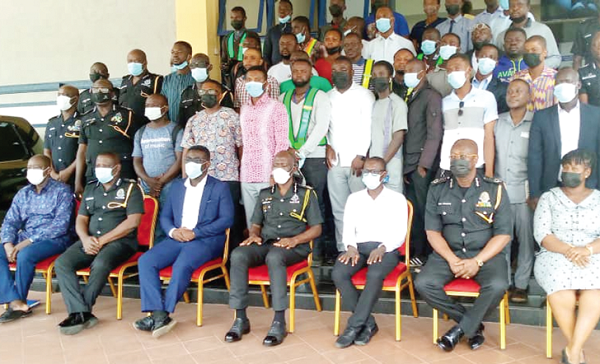 Dr George Akuffo Dampare (arrowed) with some courier services operators after the meeting