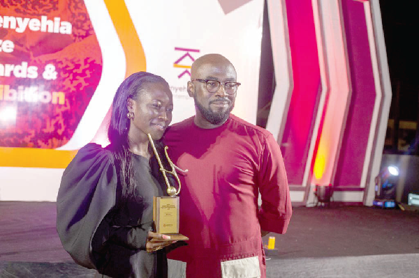 Mr Elikem Kuenyehia, Founder of Kuenyehia Trust, with Ms Lois Arde-Acquah, the award winner