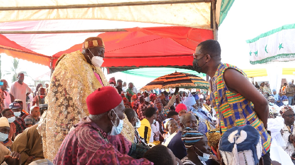 Mr Mark Okraku Mante (right), Deputy Minister of Tourism, Arts and Culture, paying homage to Masaba Sariki Nana Fanyinama, the Overlord of the Wangara tribe in Ghana, at the durbar in Kintampo