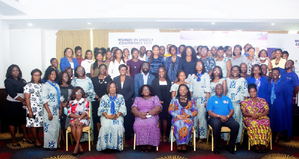 Mr Martin Eson-Benjamin (seated 2nd from right), Chief Executive of MiDA, and Professor Ellen Bortei-Doku Aryeetey (seated right), former Director of the Centre for Social Policy Studies at the University of Ghana, with some of the participants