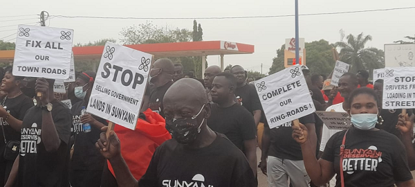The demonstrators marching on the streets of Sunyani