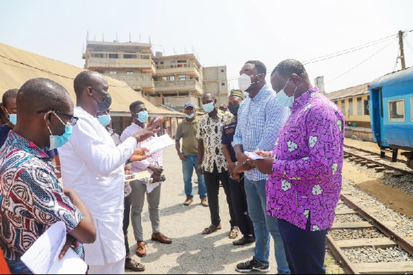 Mr Nasir Alfa Mohammed (2nd from left), Vice Chairman of the Public Interest and Accountability Committee, interacting with Mr Michael Addison (2nd from right), a civil engineer, and others during a visit to the Accra Railway Station Platform Project. Picture: EDNA SALVO-KOTEY