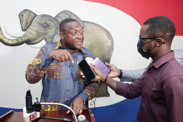 Mr Yaw Buaben Asamoah, the Director of Communications of the NPP, explaining a point to some journalists after the media briefing. Picture: EDNA SALVO-KOTEY