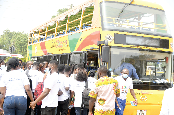 Some of the service persons boarding a tourist bus for a town ride as part part of the launch of the programme. Picture: EBOW HANSON