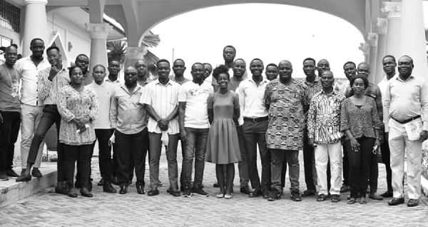 Some media practitioners and the event organisers after the seminar