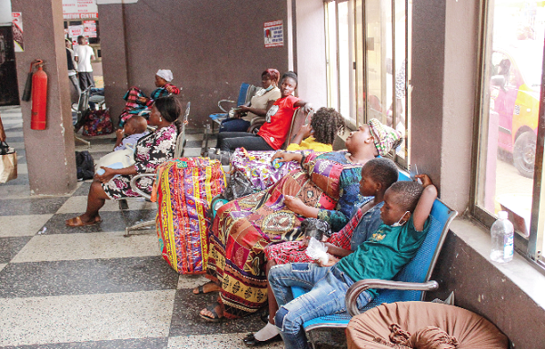  Some travellers at the Circle VIP bus terminal patiently waiting to be ushered into their respective buses. Picture: ERNEST KODZI