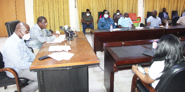 Mr Kwasi Amoako Atta (2nd from left), Minister of Roads and Highways, addressing the meeting.  Picture: ESTHER ADJEI 