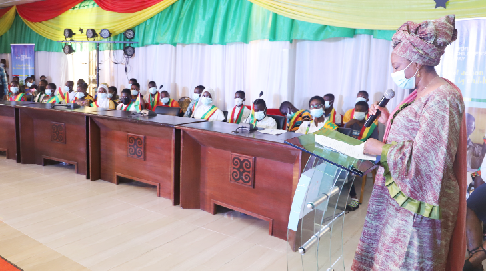Dr. Afisah Zakaria (right), Chief Director of the Ministry of Gender, Children and Social Protection, addressing the children at the event.