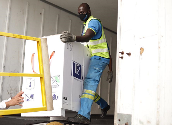 The Oxford AstraZeneca COVID-19 vaccine being offloaded from the Emirates Airlines flight EK787 at the Kotoka International Airport in Accra