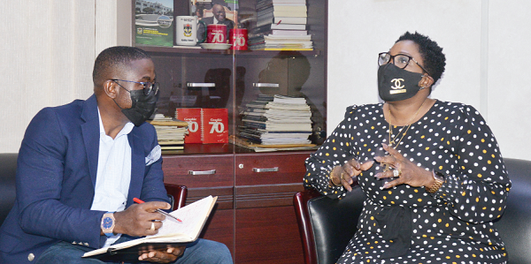  Mrs Tina Jacobs, a Data Analyst, being interviewed by Mr Charles Okine, Assistant Editor, Graphic Business
