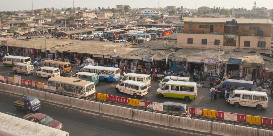 A bus and tro-tro station in Accra, Ghana. nicolasdecorte/Shutterstock