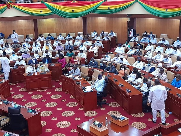 MPs-elect on the NDC side sitting at the side designated for Majority