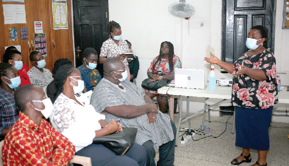 Ms. Nancy Ansah (right), Programmes Manager of Ghana Somubi Dwumadie, Hope for Future Generations interacting with participants in the forum.  Picture: MAXWELL OCLOO