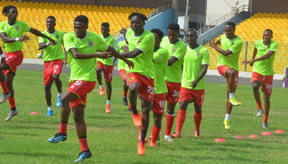Players of Asante Kotoko warming up ahead of a game