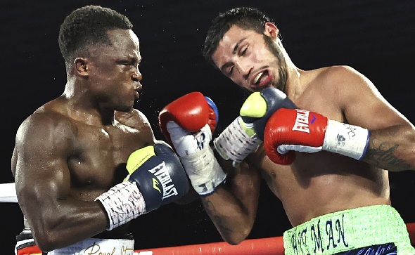 Isaac Dogboe (left) knocked out Chris Avalos in eight rounds