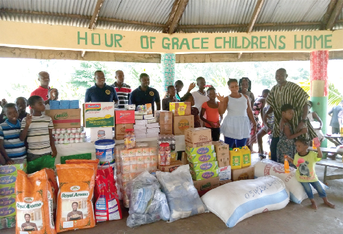  Leadership of the KNUST Alumni handing over items to the Hour of Grace Children's Home