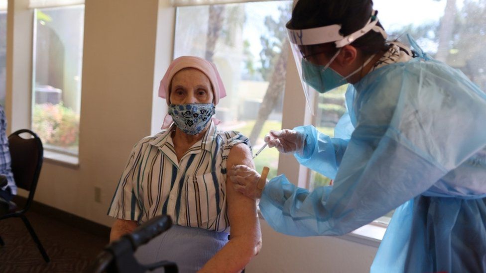 The US is in a race to vaccinate its population amid a winter surge