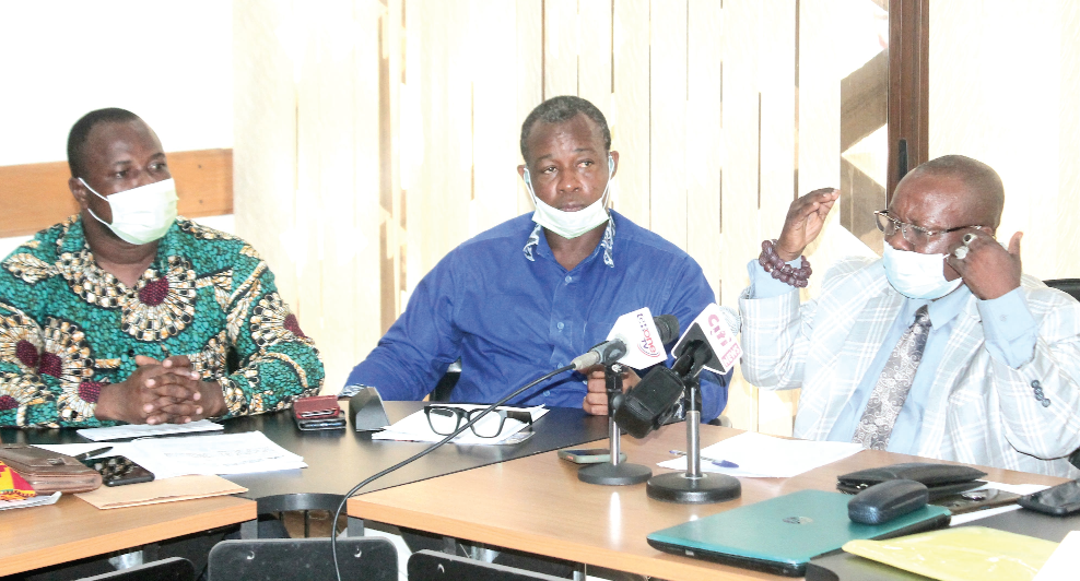 Mr Emmanuel Tetteh Martey (right) responding to questions during the press conference. With him are Mr Emmanuel Cherry (left) and Mr Adam Bonaa (middle), Vice-Chairman, GhCCI. Picture: Maxwell Ocloo