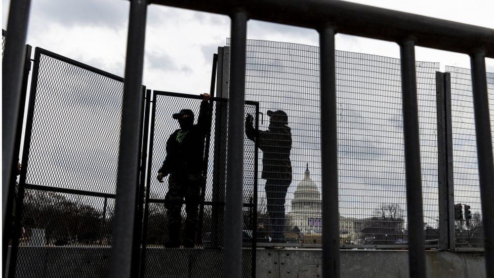 Barricades are being assembled around the US Capitol ahead of the 20 January inauguration of Joe Biden and Kamala Harris