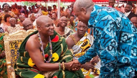 Former President John Dramani Mahama (right) exchanging pleasantries with Togbe Afede XIV