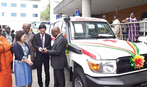  Mochizuiki Hisanobu (2nd from right), the Japanese Ambassador to Ghana, handing over the keys to the vehicles to Kwaku Agyeman-Manu (right), Minister of Health. With them are  Mahama Asei Seini (3rd from right), a Deputy Minister of Health, Suzuki Momoko (left), Chief Representative of JICA, Ghana Office. Picture: EMMANUEL QUAYE