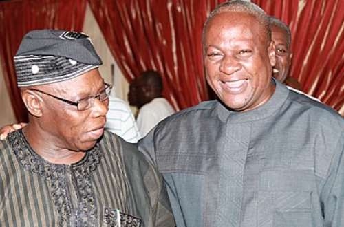 Former President John Dramani Mahama (right) with former President of Nigeria, Olusegun Obasanjo