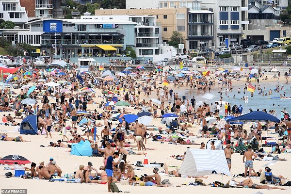 Thousands of young people defy coronavirus rules to mark Australia Day