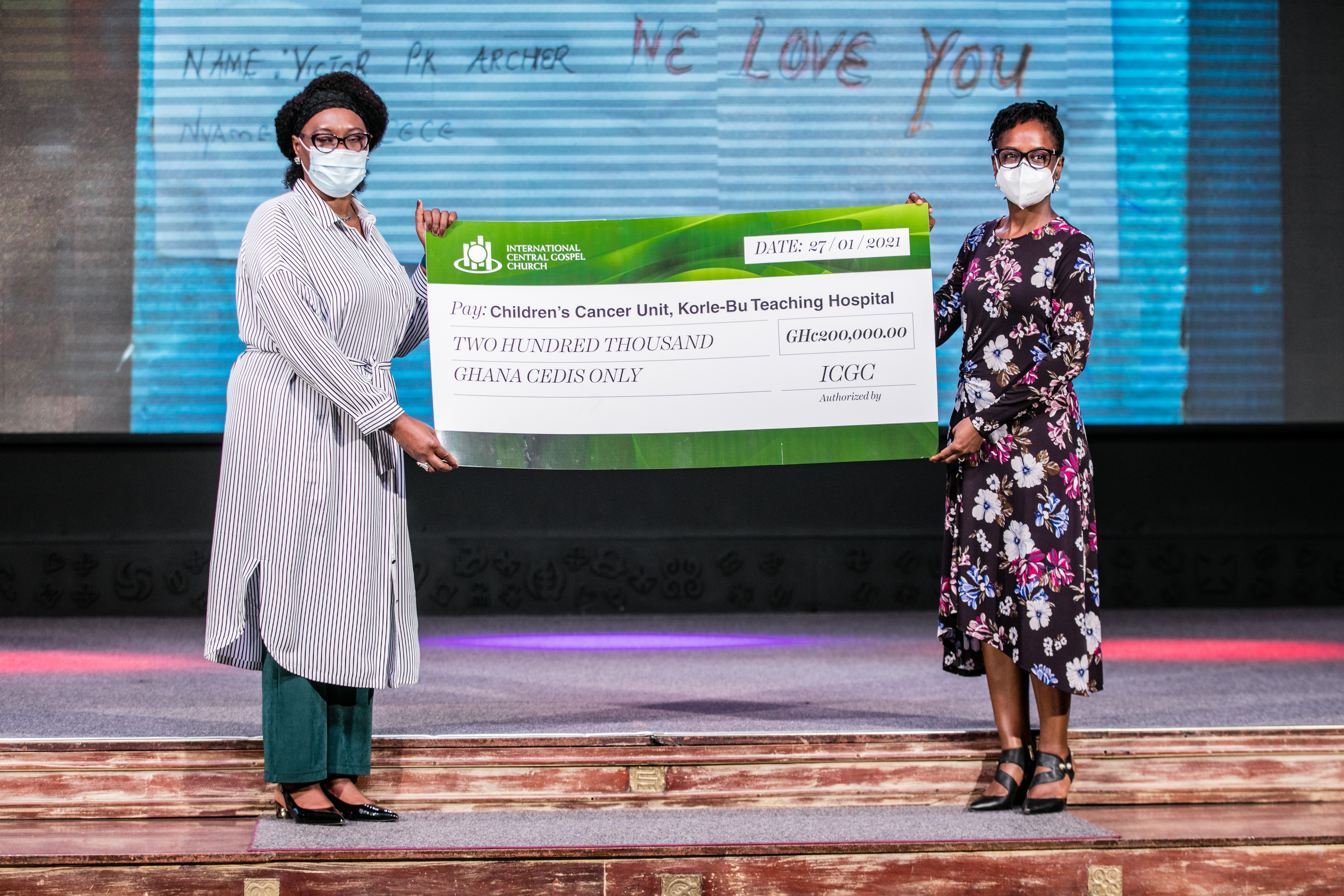 Mrs. Joy Otabil presenting the cheque to Dr. Catherine Segbefia of the Korle Bu Children’s Cancer Unit