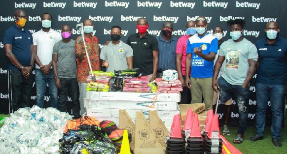 Betway presenting some equipment to the amputee team
