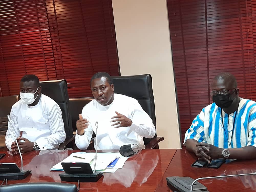 Mr Afenyo-Markin (middle) addressing the media. With him are Mr Frank Annoh-Dompreh (left), Majority Chief Whip, and Mr Bryan Acheampong (right), MP for Abetifi