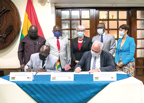  Mr Mazisi Parkes (left), CEO, Aerojet Aviation Limited, and Mr Jonathan Berger, MD, Alton Aviation Consultancy, signing the agreement. Looking on are Mrs Stephanie Sullivan (middle), US Ambassador to Ghana; Mr Hassan Tampuli (2nd left), Deputy Transport Minister; Mr Kofi Amankwa-Manu (left), Deputy Defence Minister; Mr Yaw Kwakwa (2nd right) MD, Ghana Airports Company Limited