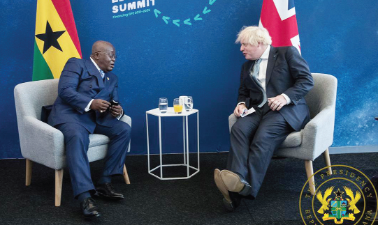 President Akufo-Addo interacting with the British Prime Minister, Boris Johnson, at the Global Education Summit in London, UK 
