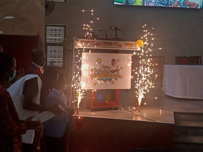 Master Uriel Boateng together with his parents and some dignitaries at the event unveiling the logo for the Uriel Foundation 