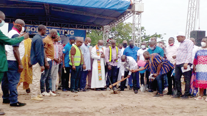 Mr Blay cutting the sod for construction of NPP Volta Regional office complex