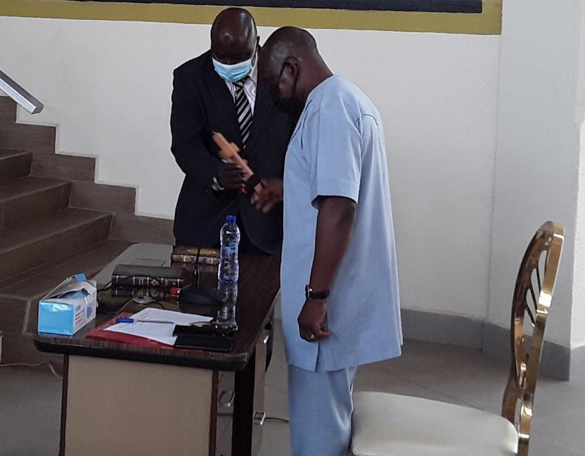 Mr Simon Osei Mensah, Ashanti Regional Minister taking an oath before the committee
