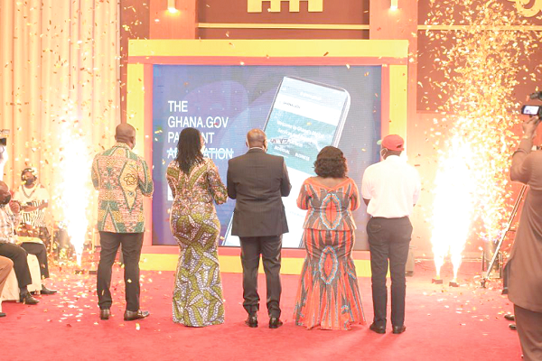 • The Vice-President, Dr Mahamudu Bawumia (middle back to camera), launching the one stop digital platform at the Jubilee House in Accra