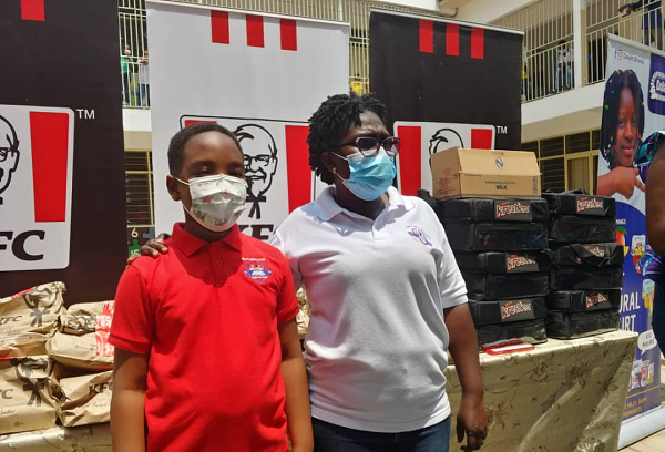 Oswald with his favourite teacher, Mrs Appiah
