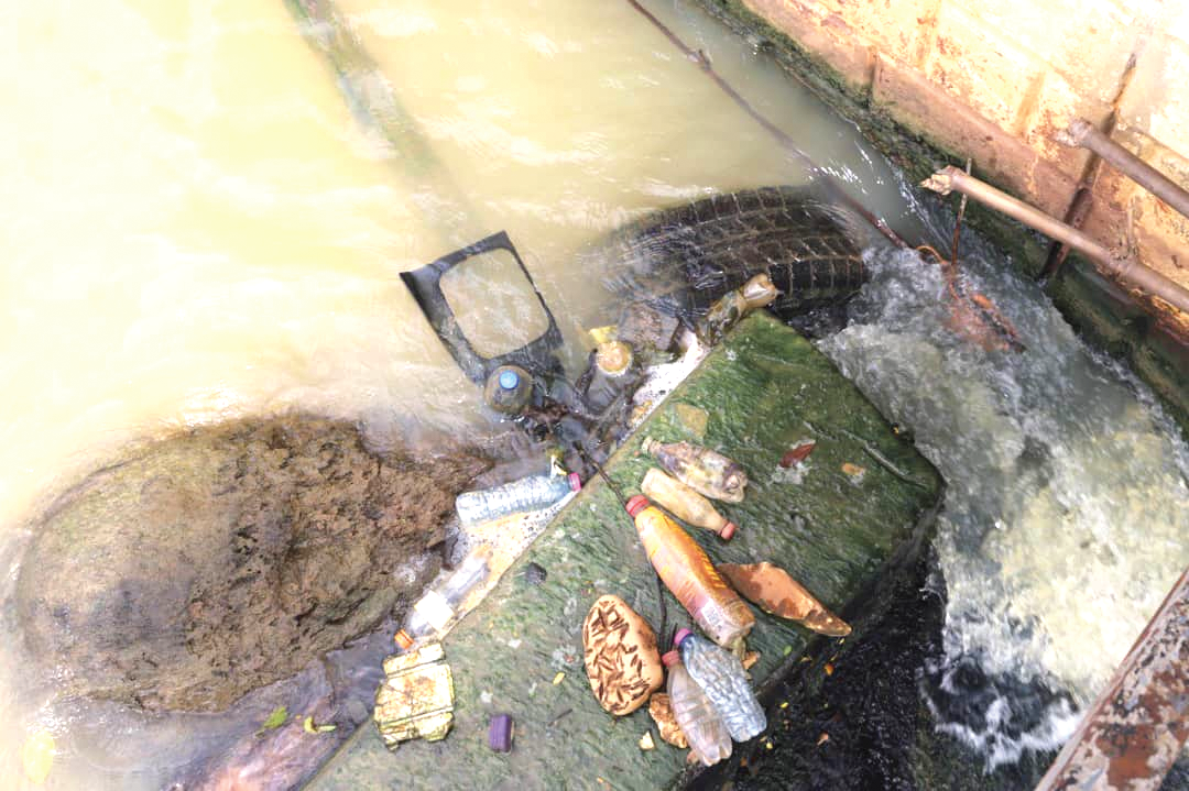 Pollutants such as plastic waste, rocks and car tyres have found their way into the dam, blocking free flow of the raw water into the treatment plant. Picture: EMMANUEL BAAH