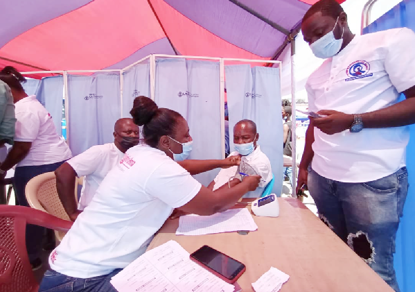 • A beneficiary of the exercise being vaccinated against Hepatitis B