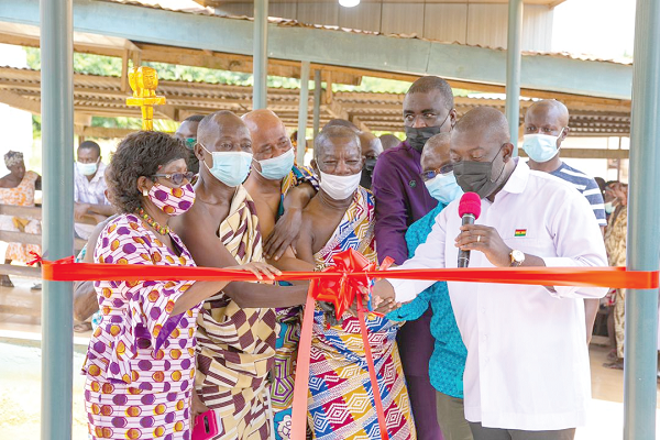 • Mr Kojo Oppong Nkrumah (right), MP for Ofoase-Ayirebi, and other dignitaries cutting the tape to open the theatre for the Brenase Hospital.