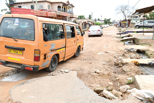 The road with choked drains leading to Race Course near Lapaz in Accra. Picture: ALBERTA MORTTY