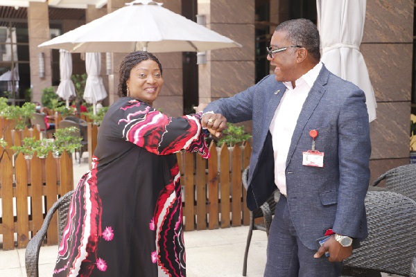 Mrs Jewel Howard-Taylor (left), Liberia’s Vice-President,   exchanging pleasantries with Mr Kobby Asmah, Editor of the Daily Graphic. Picture: EDNA SALVO-KOTEY