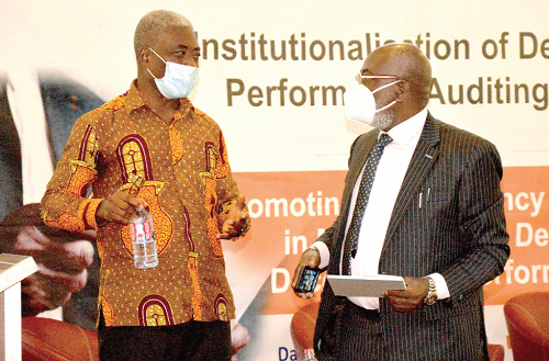Mr Jacob Essilfie (left)  Assistant Auditor-General, Ghana Audit Service, in a conversation with Dr. James Klutse Avedzi, Chairman of Public Accounts Committee. Picture: ALBERTA MORTTY