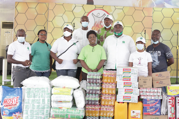 Mr Koku Anyidoho (3rd right), Founder and CEO of the Atta Mills Institute, with members of the foundation after the presentation