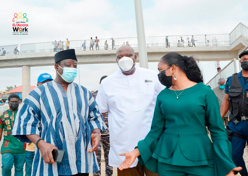 Mr Kwesi Amoako Atta (left), the Roads and Highways Minister, and Mr Henry Quartey (middle) at the Pokuase Interchange